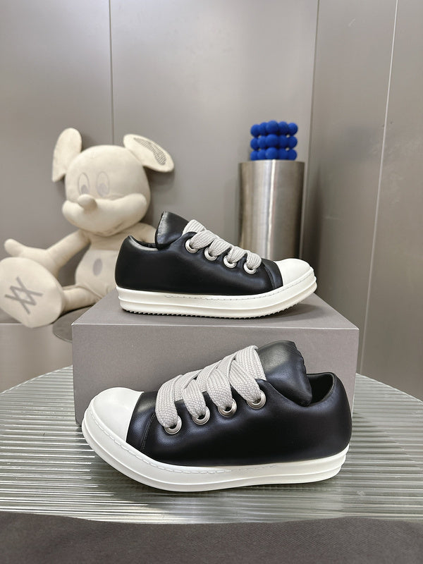 Rick Owens Low-top Sneakers - Black Unisex Streetwear Limited Edition - **Rick Owens Black Low-Top Sneakers: Avant-Garde Elegance and Comfort** Step into the future of fashion