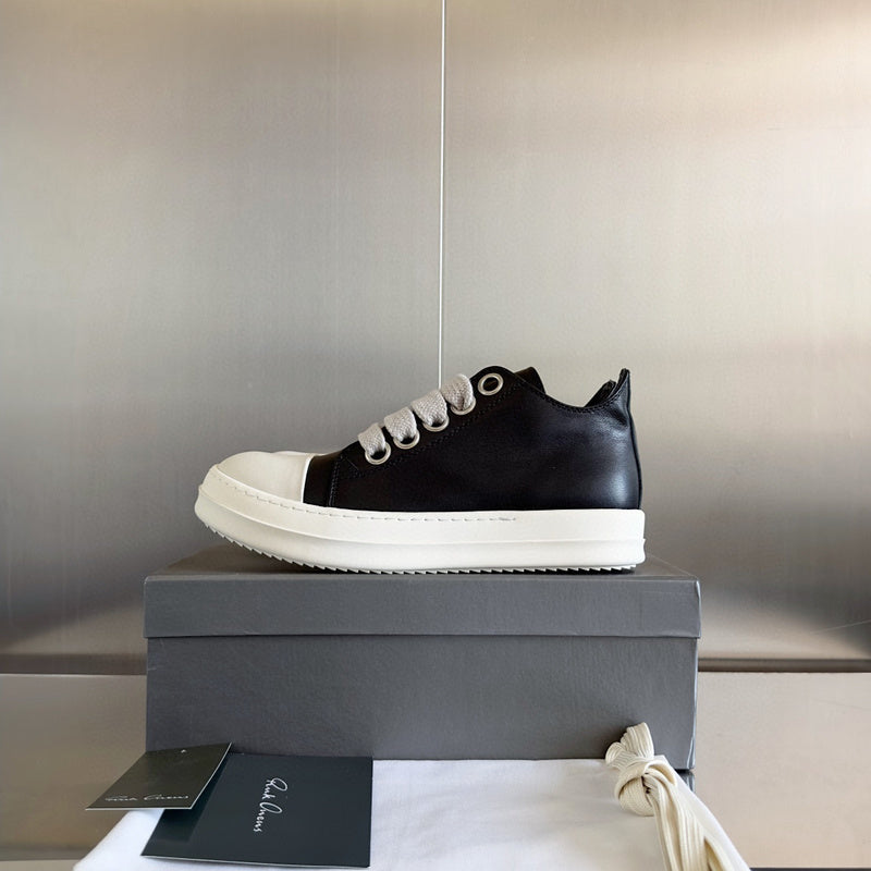 Rick Owens Low-top Sneakers - Black Unisex Streetwear Limited Edition - **Rick Owens Black Low-Top Sneakers: Modern Elegance and Superior Craftsmanship** Introducing the Rick Owens Black