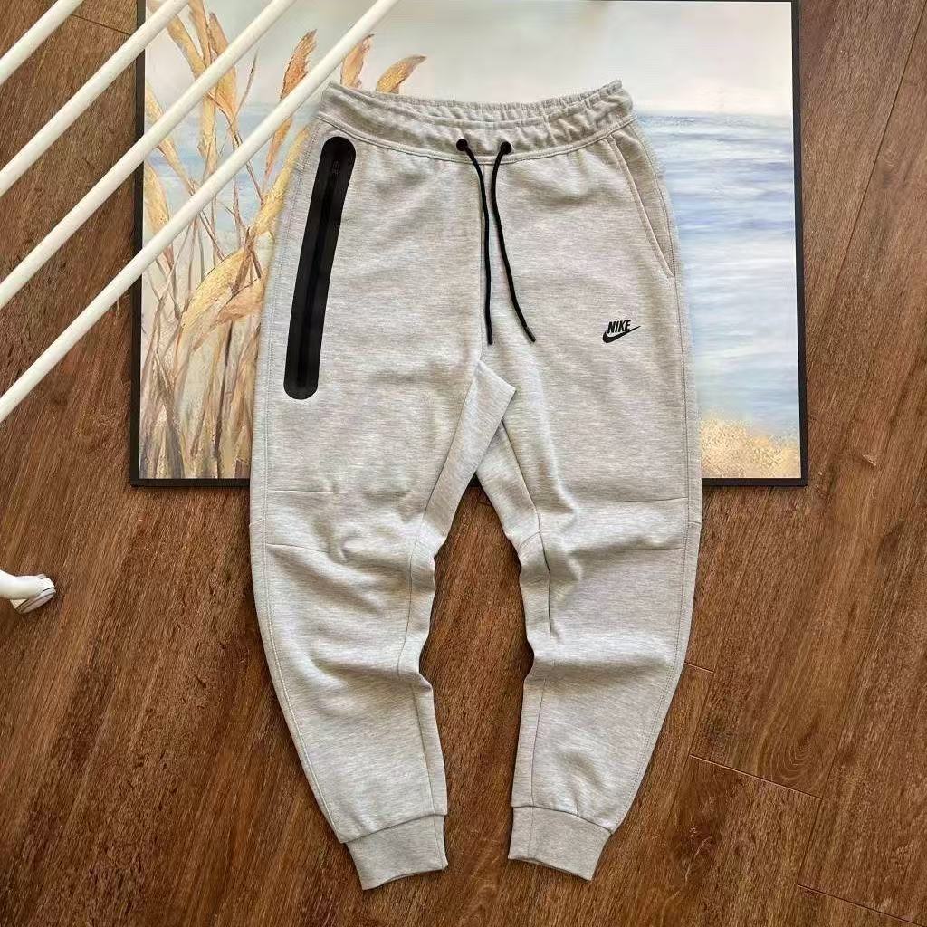 NIKE Tech Fleece Pants - Washed Teal - Red Unisex Streetwear Limited Edition - The NIKE TECH FLEECE PANTS WASHED TEAL - REPLICA offer the perfect blend of modern
