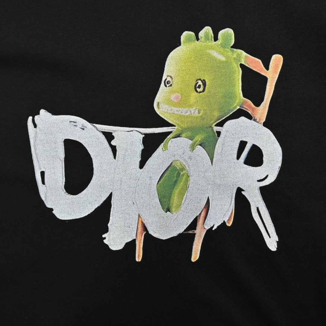 Dior Green Monster Graphic T-shirt - Black Unisex Streetwear Limited Edition - This Dior t-shirt features a playful green monster graphic intertwined with the brand name in