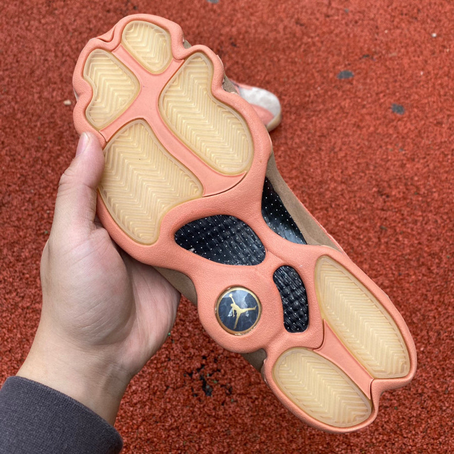 Jordan 13 - Pink Unisex Streetwear Limited Edition - The Air Jordan 13 Low featured here is a striking blend of textures and tones,