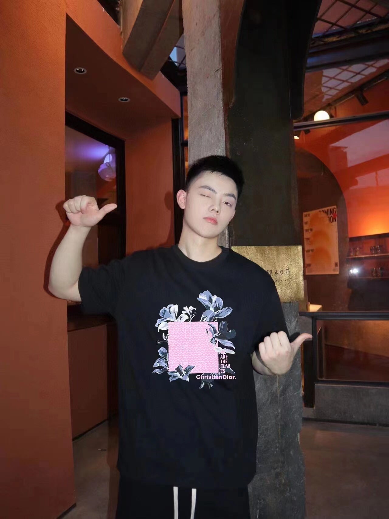 Dior T-shirt With Floral Graphic Design - Black Unisex Streetwear Limited Edition - <p dir='ltr'><span>This Dior t-shirt features a floral graphic design with text elements. It is