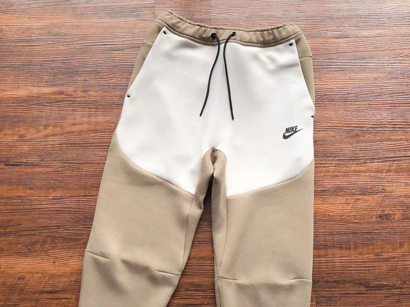 NIKE Tech Fleece Pants - Sandalwood - Light Bone - White Unisex Streetwear Limited Edition - The NIKE TECH FLEECE PANTS SANDALWOOD/LIGHT BONE WHITE - REPLICA offer the perfect balance of