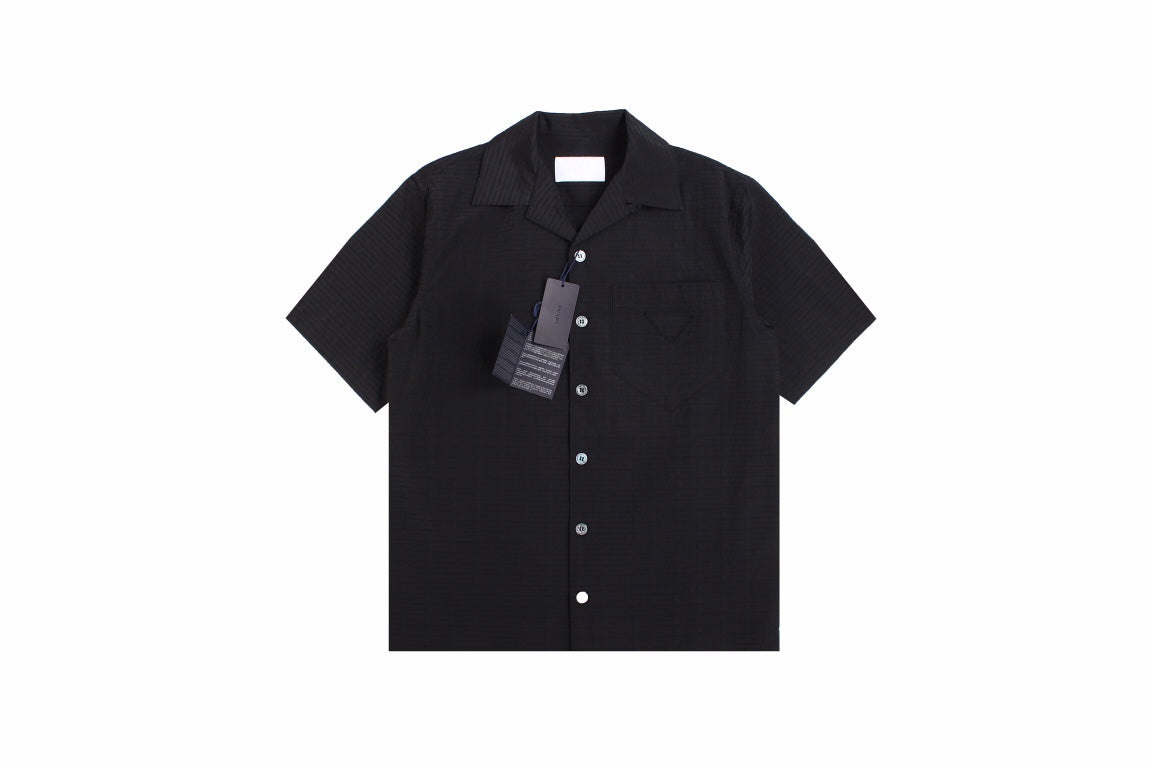Prada Short-sleeve Button-up Shirt - Black Unisex Streetwear Limited Edition - <p dir='ltr'><span>Black short-sleeve button-up shirt with a subtle checkered pattern. Features a front pocket