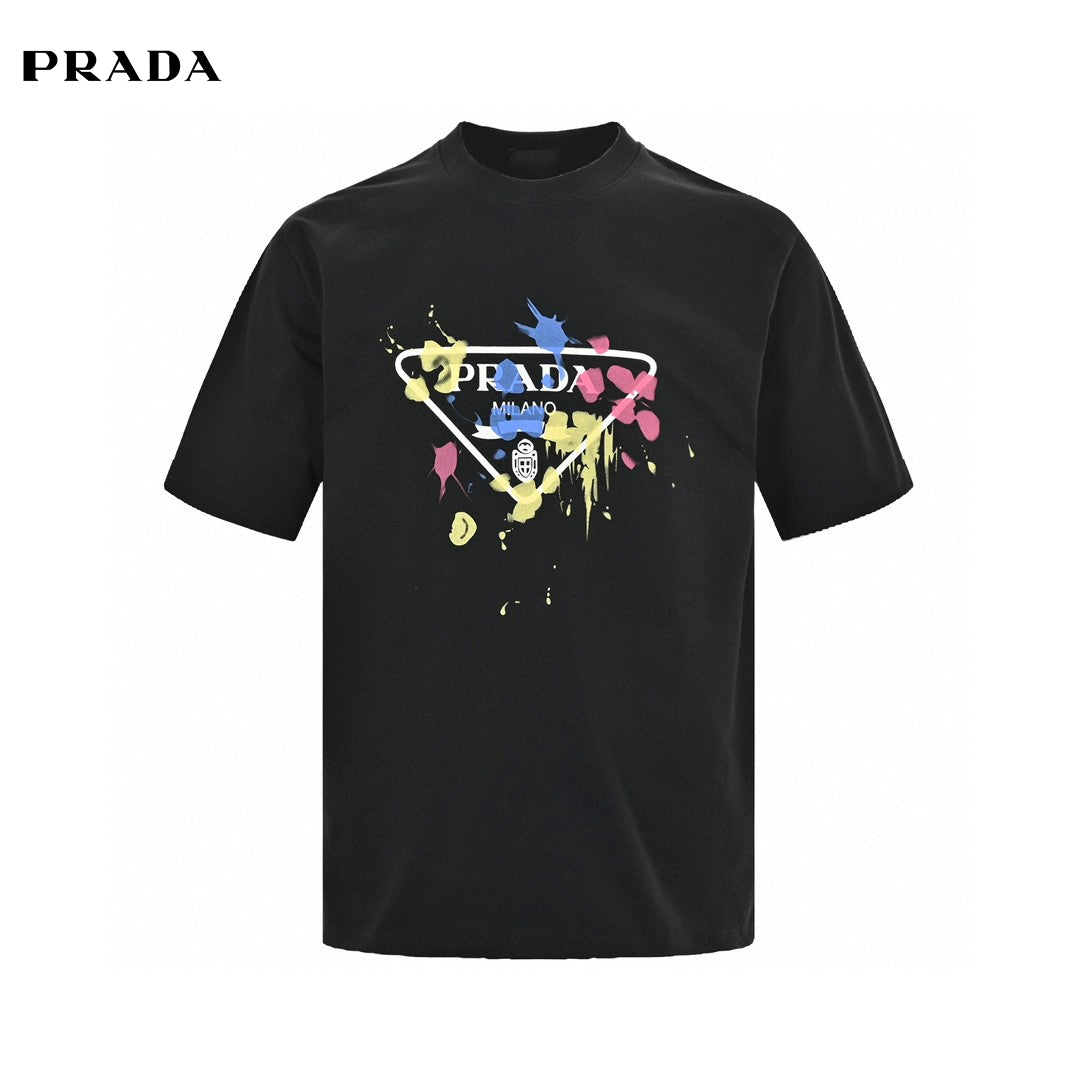 Prada T-shirt - Paint Splatter Logo - Black Unisex Streetwear Limited Edition - <span>This Prada t-shirt features a unique design with the classic Prada Milano logo surrounded by