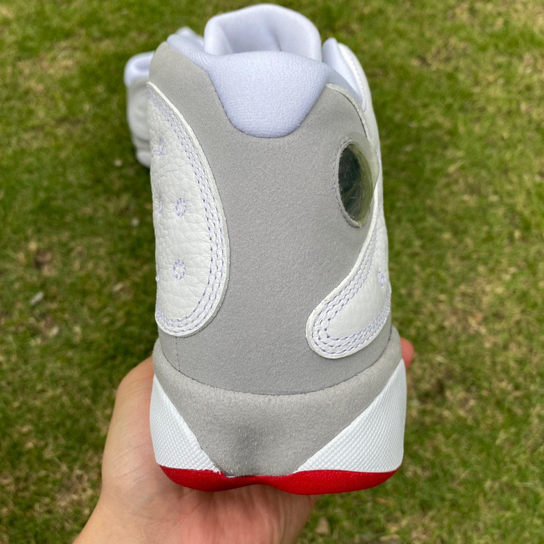 Jordan 13 Retro 'history Of Flight' - White Unisex Streetwear Limited Edition - The Air Jordan 13 Retro 'History of Flight' is a striking blend of classic design