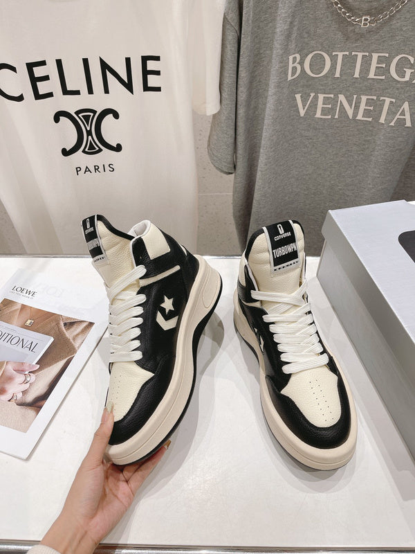 Rick Owens High-top Sneakers - Black Unisex Streetwear Limited Edition - **Rick Owens High-Top Sneakers: Dual-Tone Elegance and Craftsmanship** Step up your fashion game with Rick