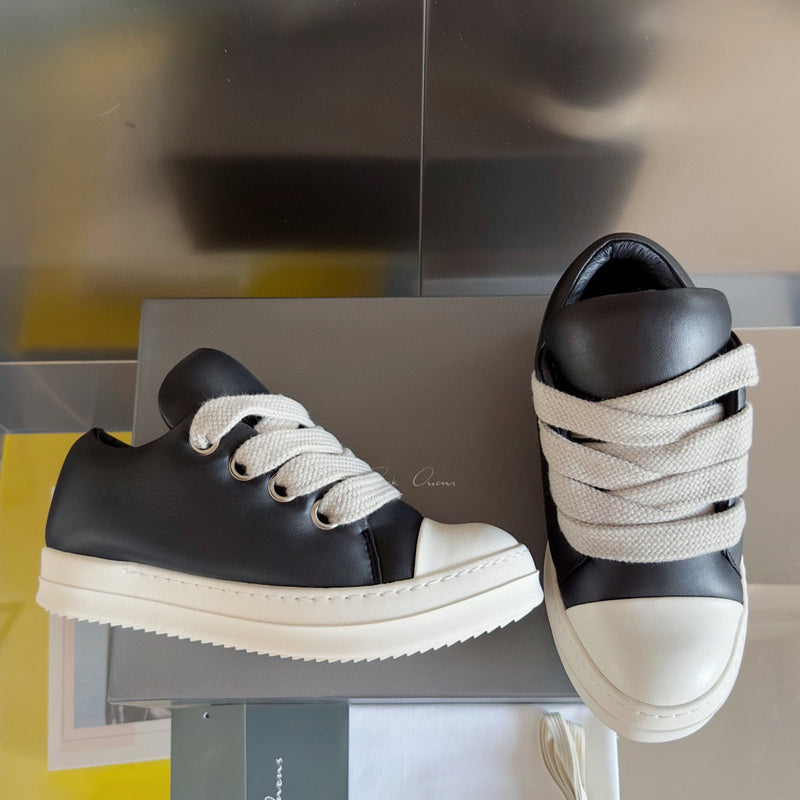 Rick Owens And White Low-top Sneakers - Black Unisex Streetwear Limited Edition - **Rick Owens Black and White Low-Top Sneakers: Modern Elegance and Superior Craftsmanship** Introducing the Rick