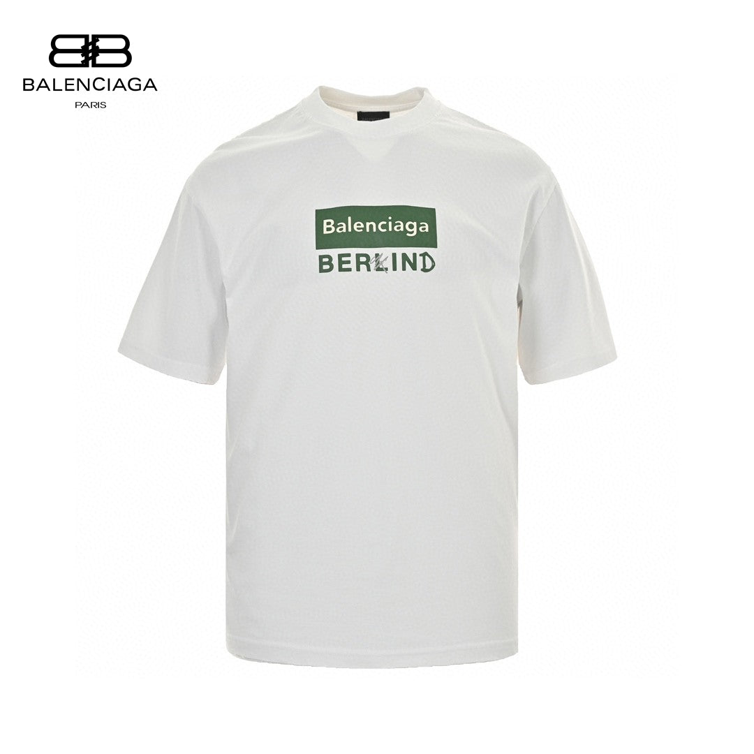 Balenciaga T-shirt - Berlin Graphic - White Unisex Streetwear Limited Edition - <span>This Balenciaga t-shirt features a minimalist design with the text 'Balenciaga' inside a green rectangular
