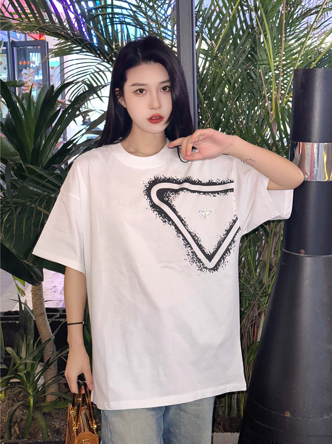 Prada Graphic Logo T-shirt - Black Unisex Streetwear Limited Edition - <span>This Prada t-shirt features a striking white design with a bold graphic logo print. The