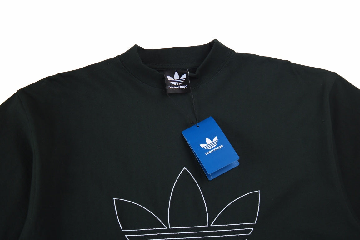 Balenciaga T-shirt With Adidas Logo - Black Unisex Streetwear Limited Edition - <p dir='ltr'><span>Black t-shirt featuring a large Adidas trefoil logo with Balenciaga branding. Combines classic