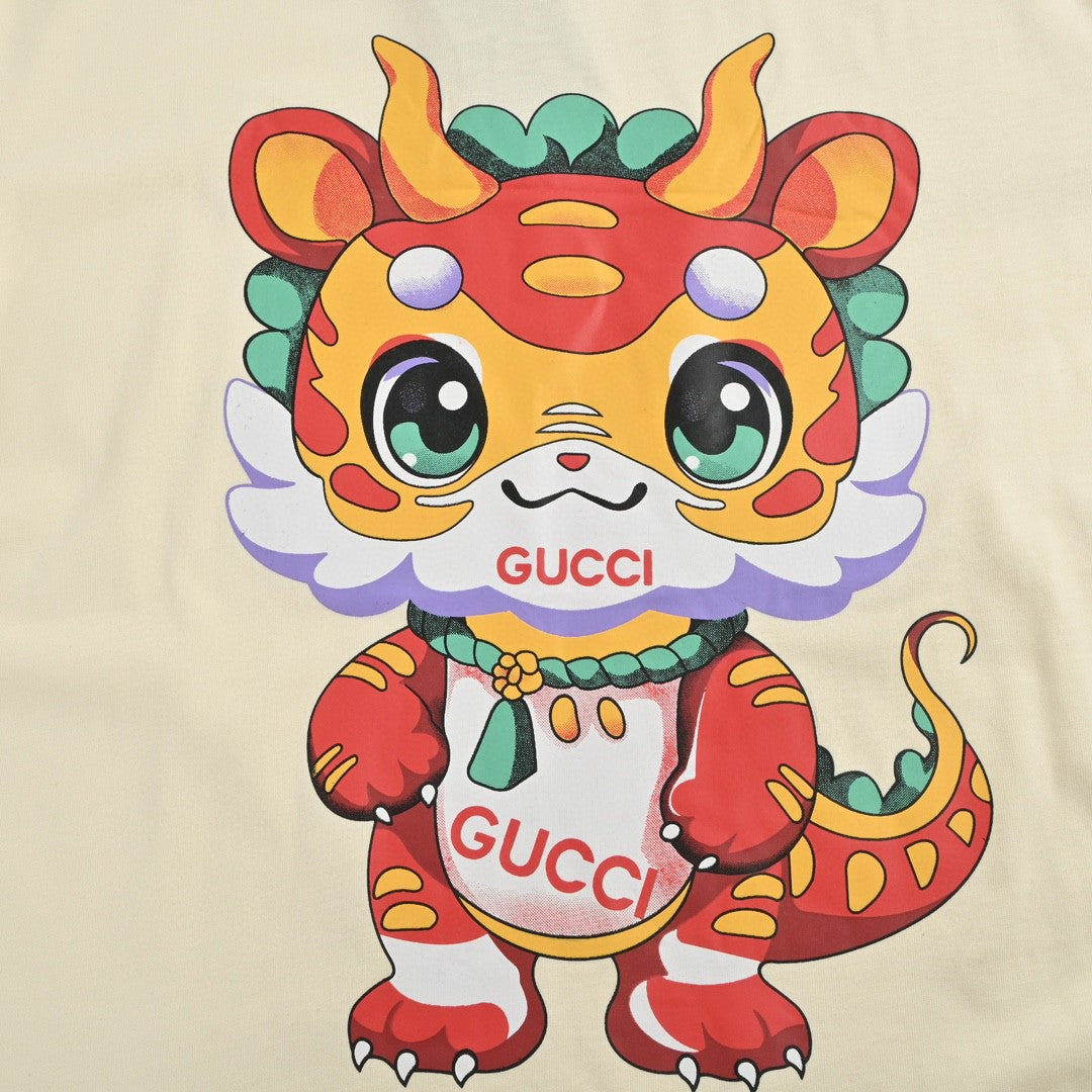 Gucci T-shirt With Dragon Cartoon - Cream Unisex Streetwear Limited Edition - <span>Playful and vibrant. Features a colorful dragon cartoon. Gucci logo on the character. Made from