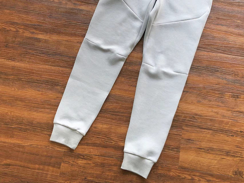 NIKE Tech Fleece Pants - Wolf Grey - Aquamarine - - Orange Unisex Streetwear Limited Edition - The NIKE TECH FLEECE PANTS WOLF GREY/AQUAMARINE/ORANGE - REPLICA offer a modern fusion of performance,