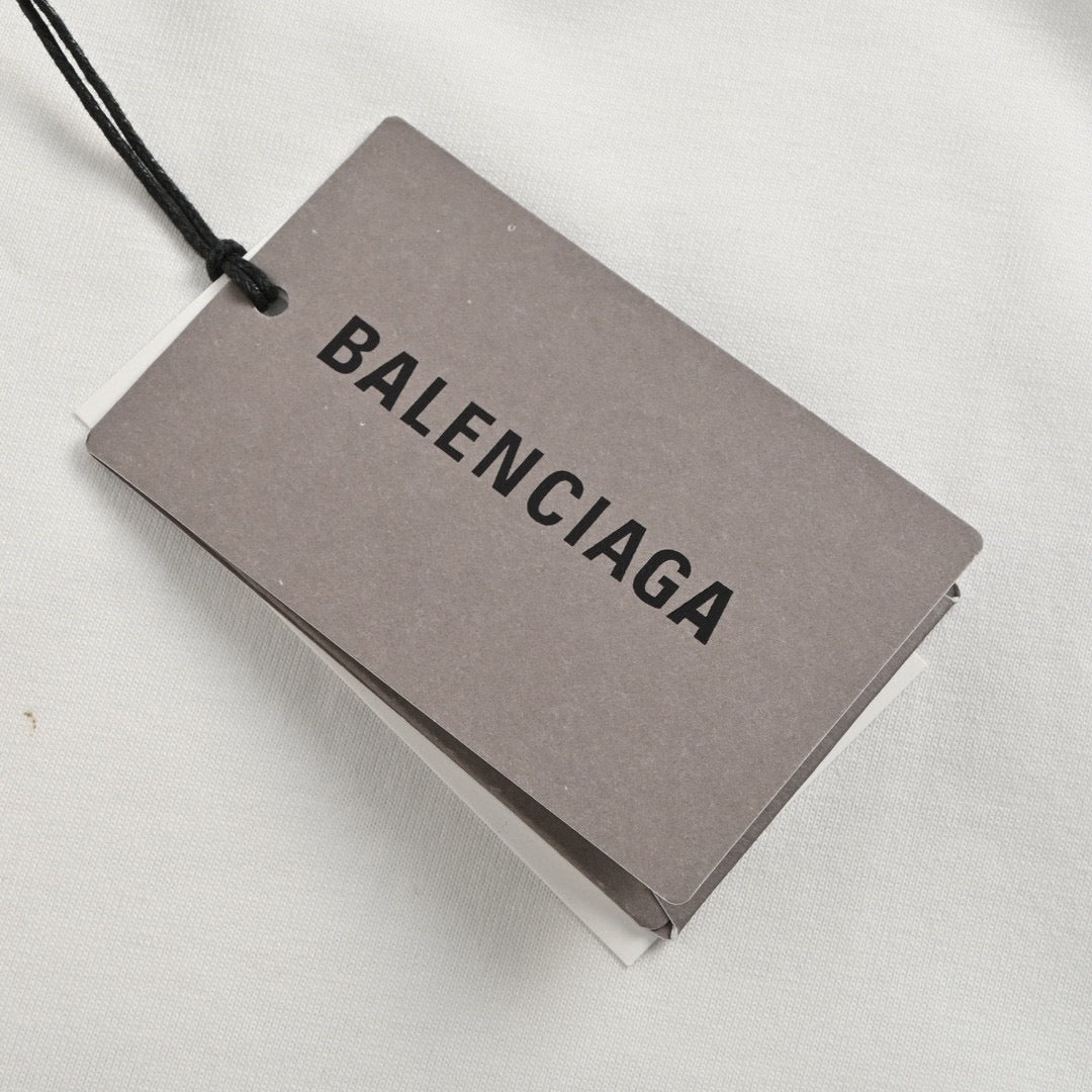 Balenciaga T-shirt With Label Detail - White Unisex Streetwear Limited Edition - <span>Minimalist design. Features a small label detail at the bottom. Made from premium fabric for
