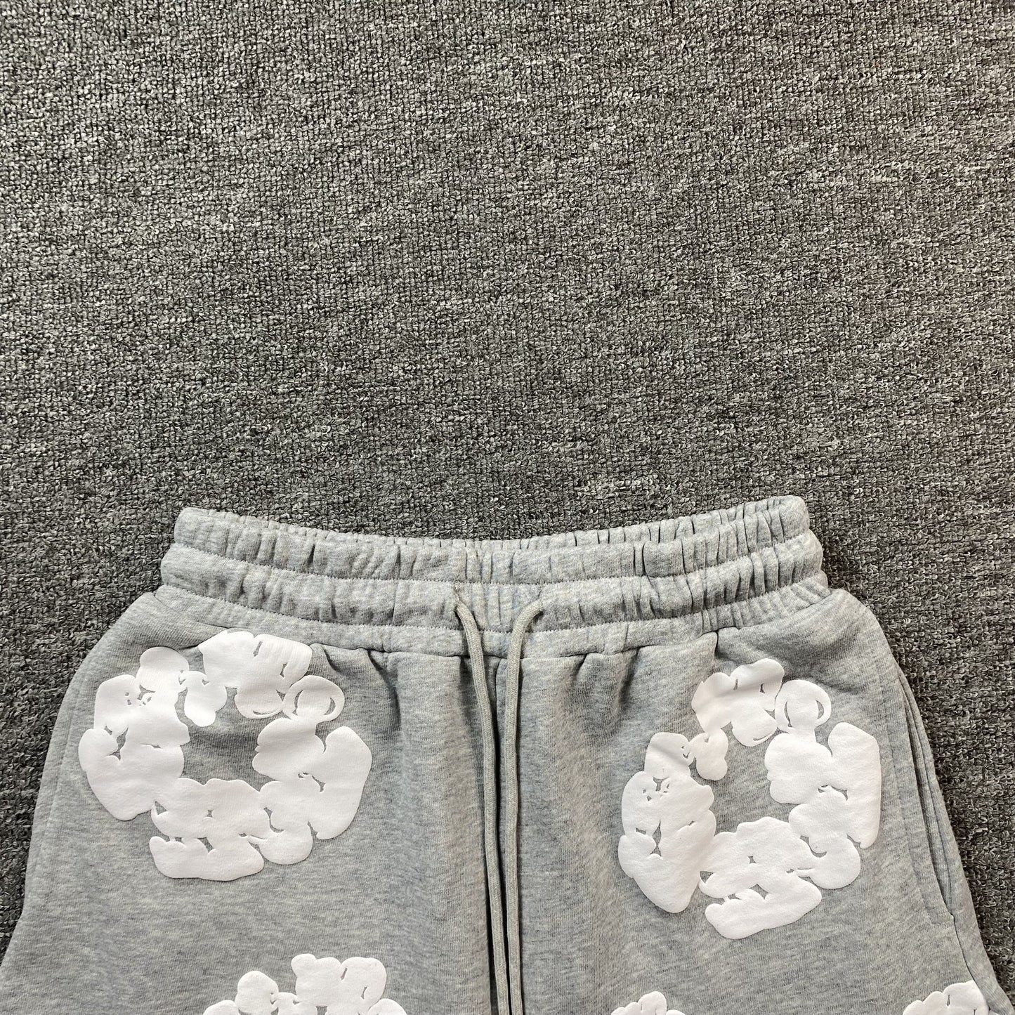 DENIM Tears Cotton Wreath Shorts - Grey Unisex Streetwear Limited Edition - The DENIM TEARS COTTON WREATH SHORTS GREY - REPLICA offer a sleek and versatile addition