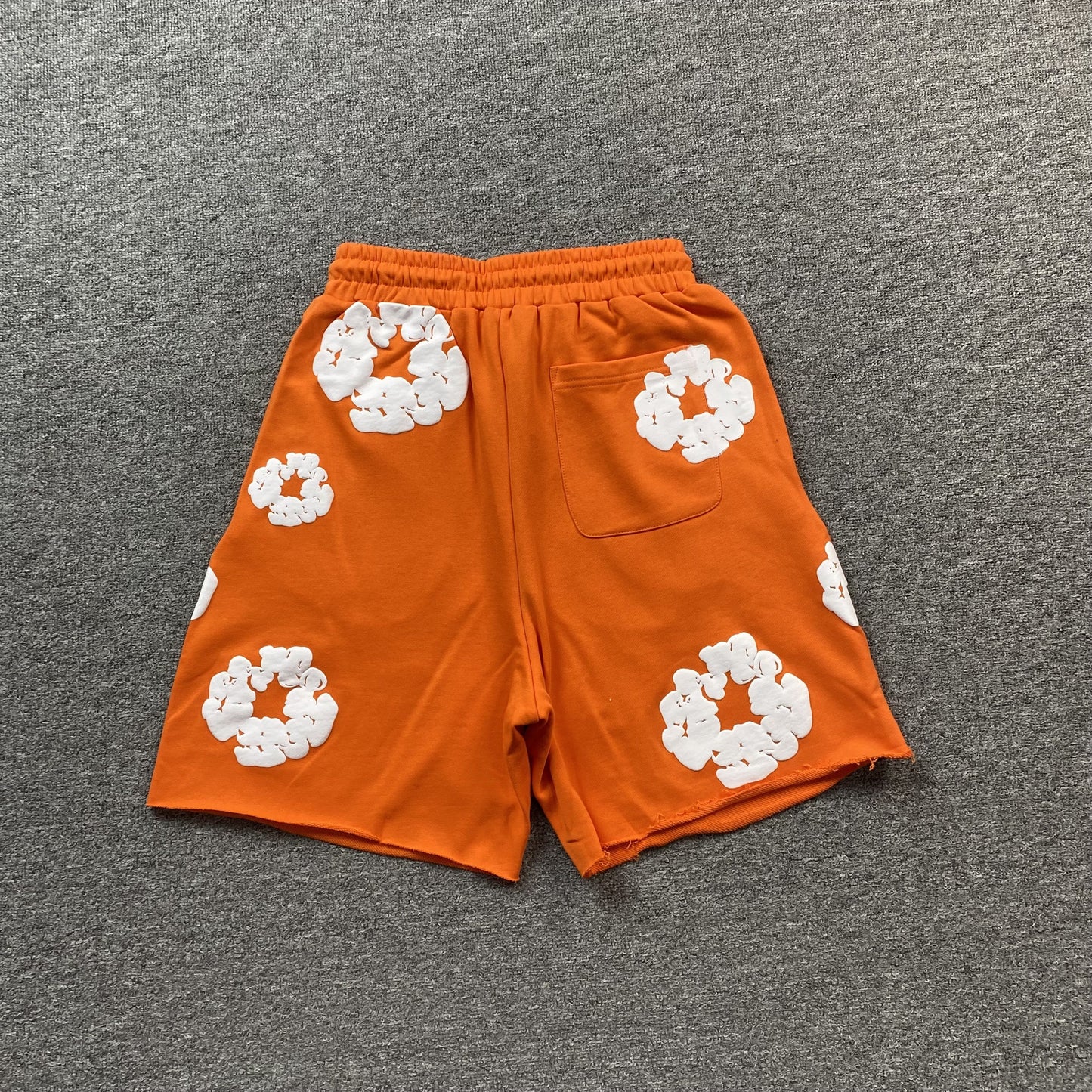 DENIM Tears Cotton Wreath Shorts - Orange Unisex Streetwear Limited Edition - The DENIM TEARS COTTON WREATH SHORTS ORANGE - REPLICA fuse vibrant style with cultural storytelling,