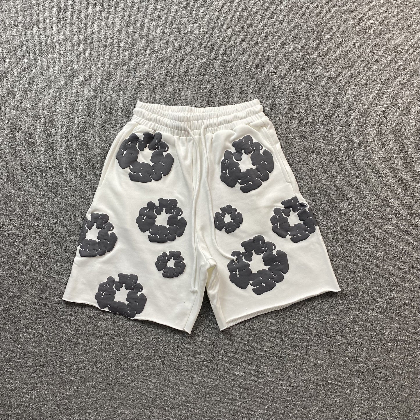 DENIM Tears Cotton Wreath Shorts - White Unisex Streetwear Limited Edition - The DENIM TEARS COTTON WREATH SHORTS WHITE - REPLICA offer a fresh and clean take