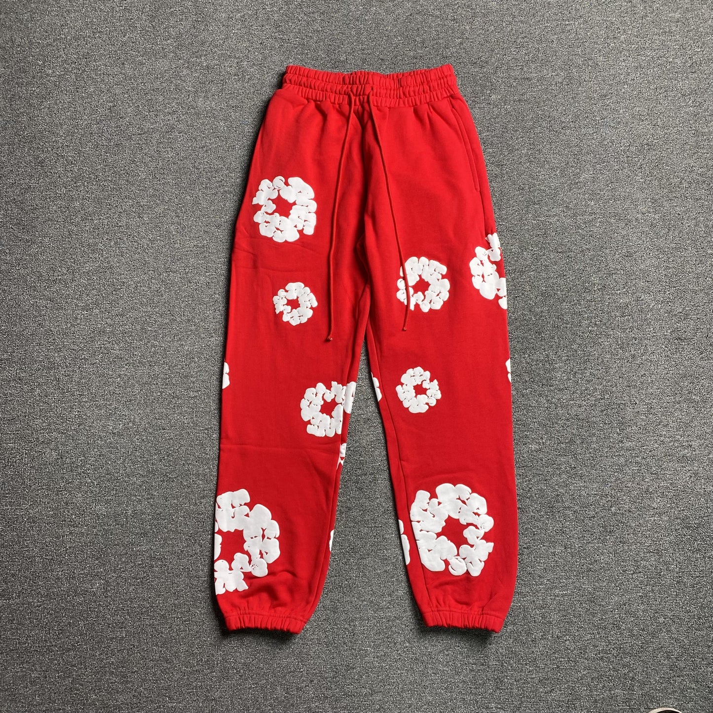 DENIM Tears Cotton Wreath Sweatpants - Red Unisex Streetwear Limited Edition - The Denim Tears Cotton Wreath Sweatpants Red Replica deliver the perfect balance of comfort and