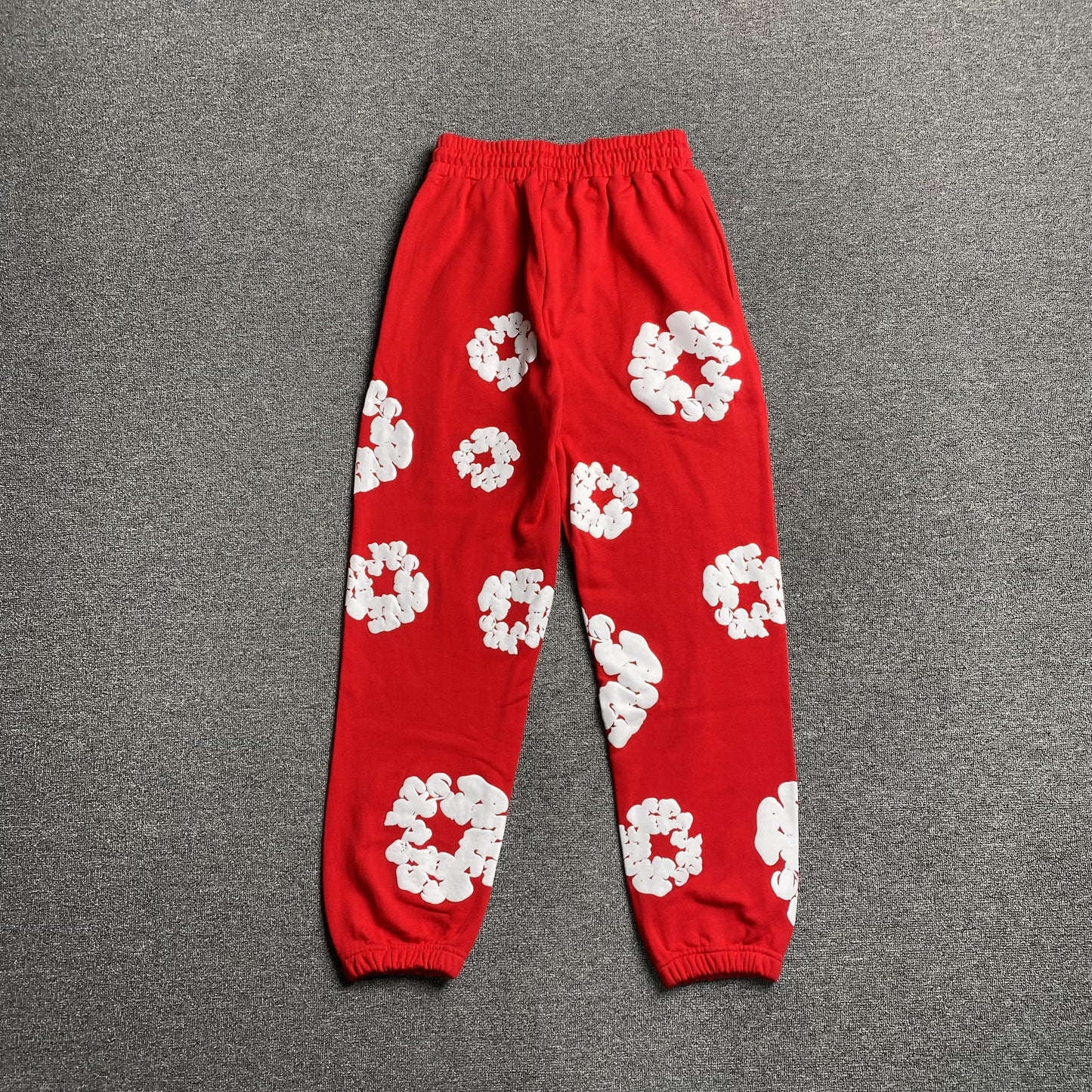 DENIM Tears Cotton Wreath Sweatpants - Red Unisex Streetwear Limited Edition - The Denim Tears Cotton Wreath Sweatpants Red Replica deliver the perfect balance of comfort and