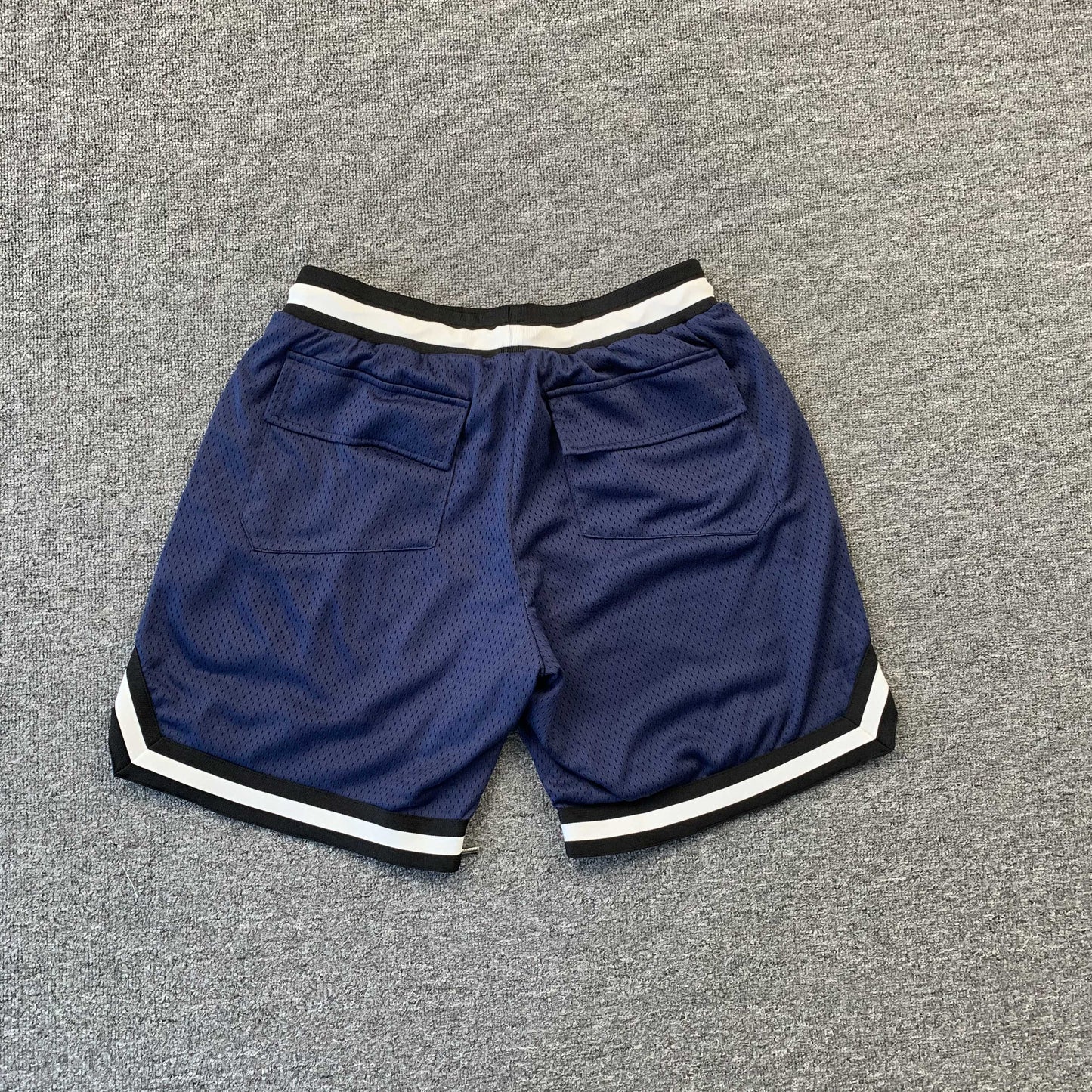 RHUDE Court Logo Shorts - Navy Unisex Streetwear Limited Edition - The RHUDE COURT LOGO SHORTS NAVY - REPLICA blend vintage basketball aesthetics with luxury streetwear