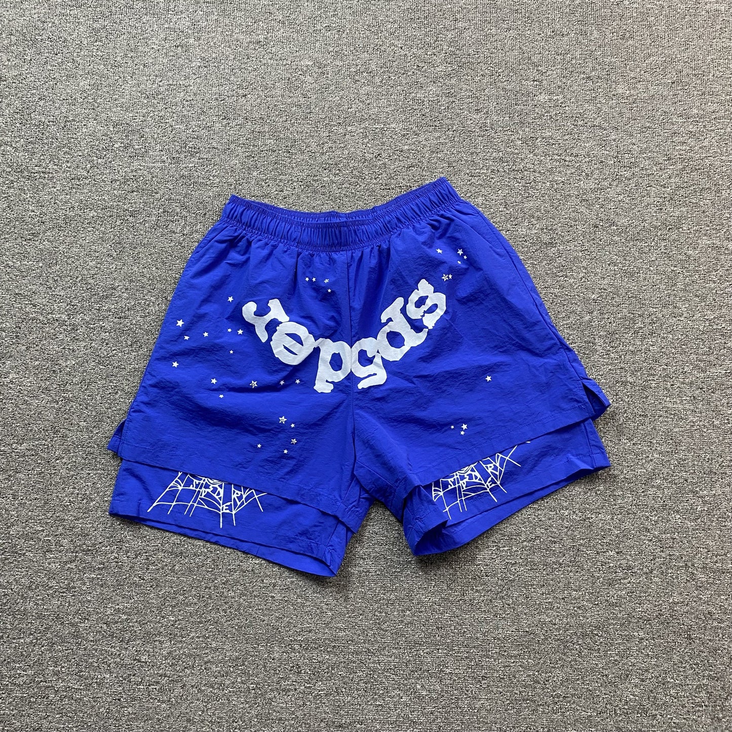 SP5DER Og Web Double Layer Short Hoodie - Blue Unisex Streetwear Limited Edition - The SP5DER OG WEB DOUBLE LAYER SHORT BLUE - REPLICA blends bold streetwear aesthetics with