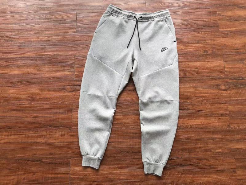 NIKE Tech Fleece Pants - - Grey Unisex Streetwear Limited Edition - The NIKE TECH FLEECE PANTS GREY - REPLICA deliver the perfect combination of modern athletic