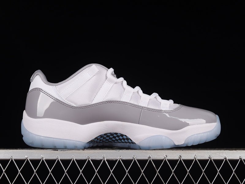 AIR Jordan 11 Retro Low - University Blue Sneakers - White Unisex Streetwear Limited Edition - Step into classic elegance with the Air Jordan 11 Retro Low White/University Blue, a timeless