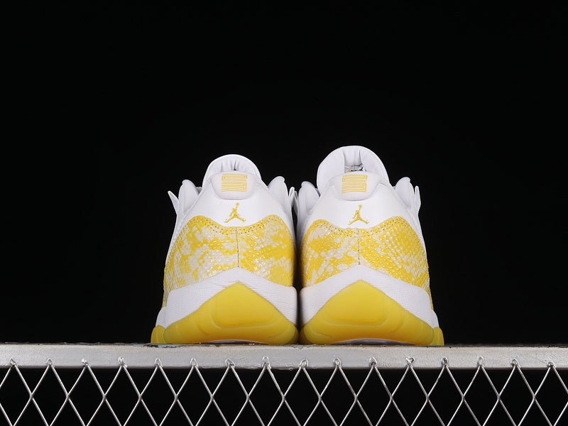 AIR Jordan 11 Retro Low Yellow Snakeskin - White Unisex Streetwear Limited Edition - Unleash your wild side with the Air Jordan 11 Retro Low Yellow Snakeskin White, a