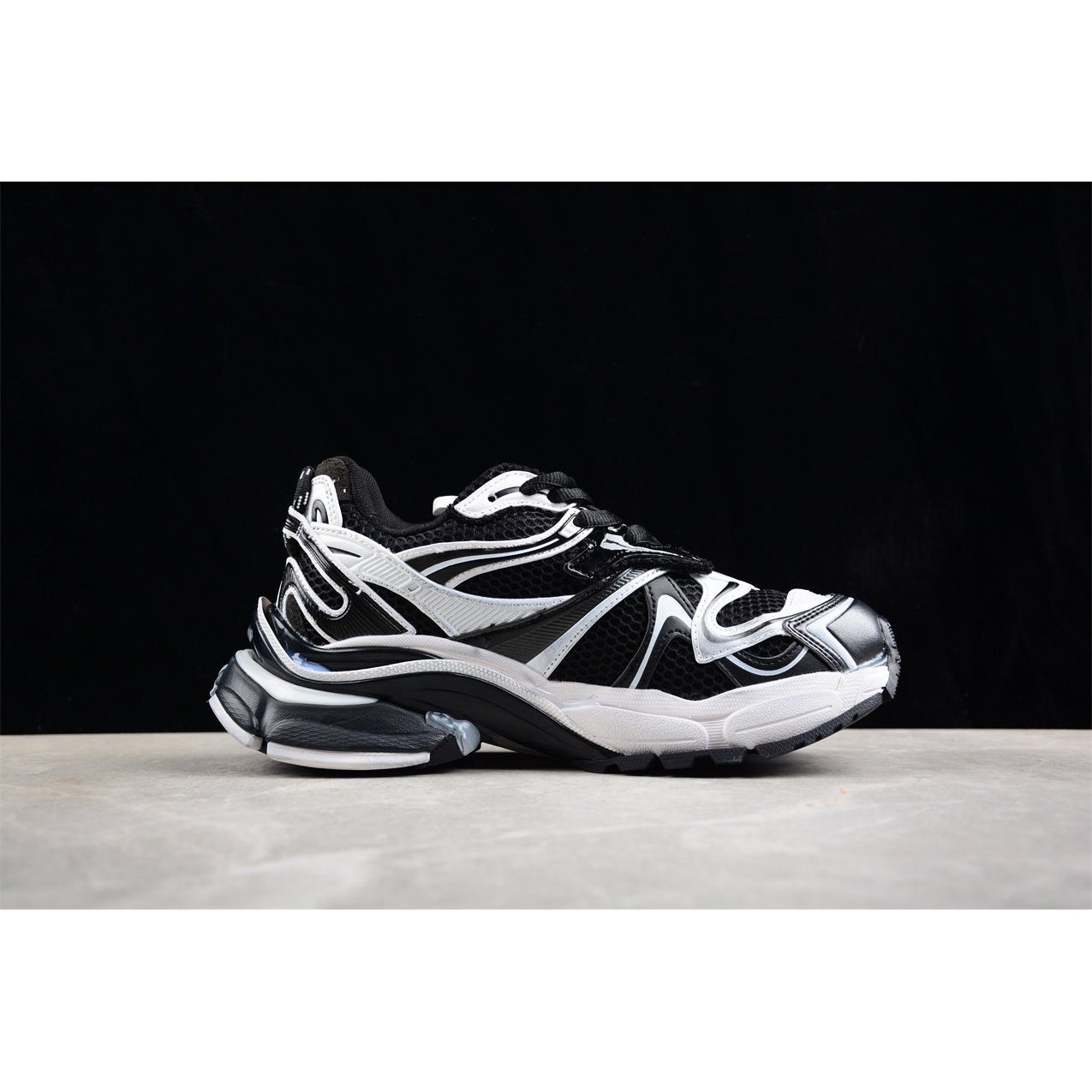 BALENCIAGA Runner - White Sneakers - Black Unisex Streetwear Limited Edition - The BALENCIAGA Runner x Black White sneakers exude a sleek and timeless elegance, perfect for