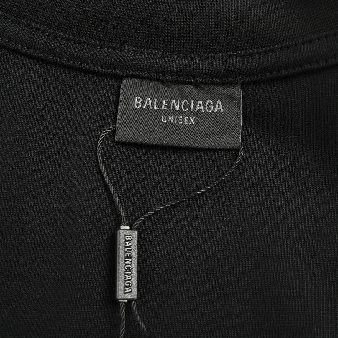 Balenciaga T-shirt - Te - T And Graphic Design - Black Unisex Streetwear Limited Edition - <span>This Balenciaga t-shirt features a bold design with various texts and a graphic on the