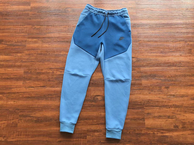 NIKE Tech Fleece Pants - Dutch - Court - Blue Unisex Streetwear Limited Edition - The NIKE TECH FLEECE PANTS DUTCH BLUE/COURT BLUE - REPLICA offer the perfect fusion of