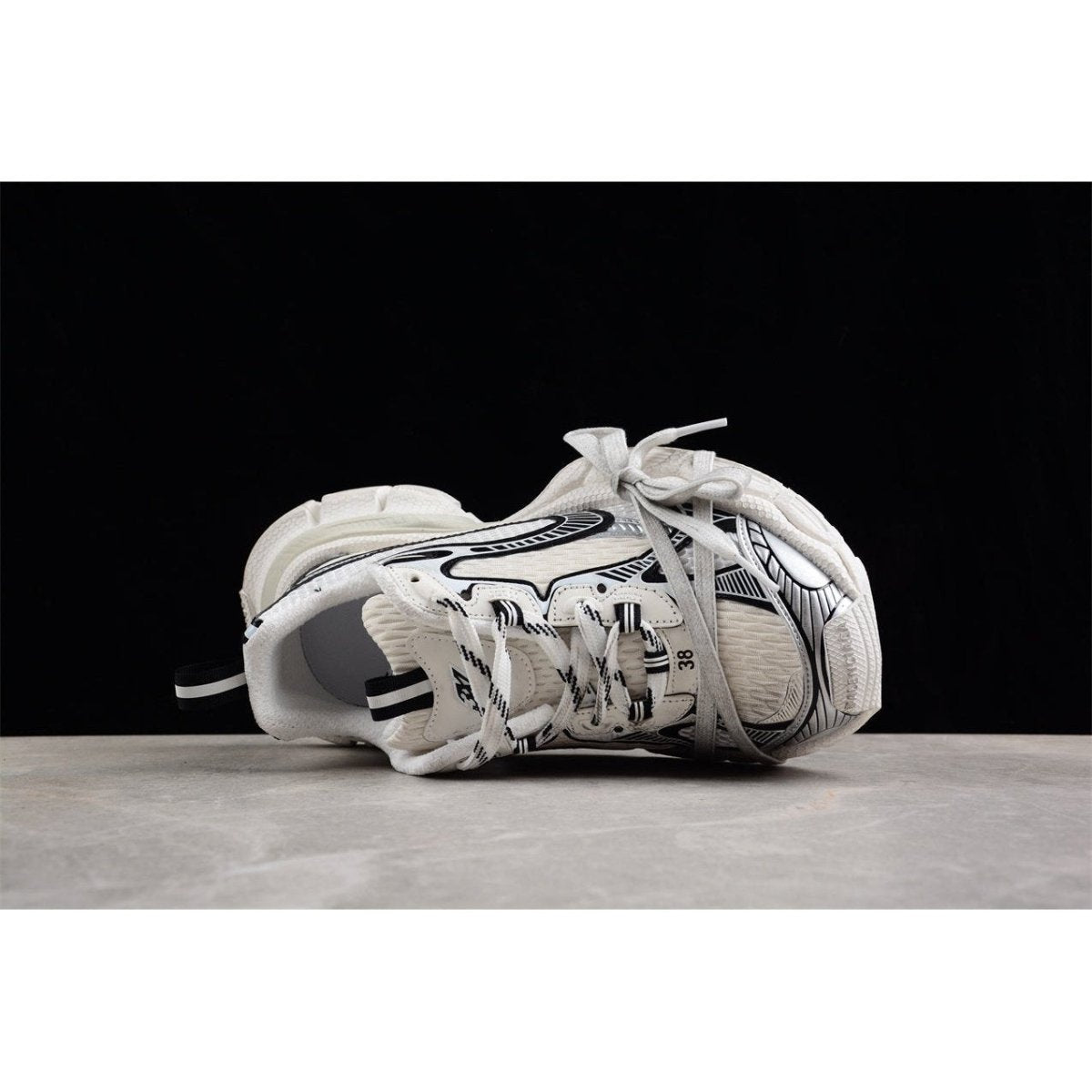 BALENCIAGA 3 - L - White Sneakers - Black Unisex Streetwear Limited Edition - The Balenciaga 3XL x White Black sneakers offer a classic colorway with a contemporary twist.