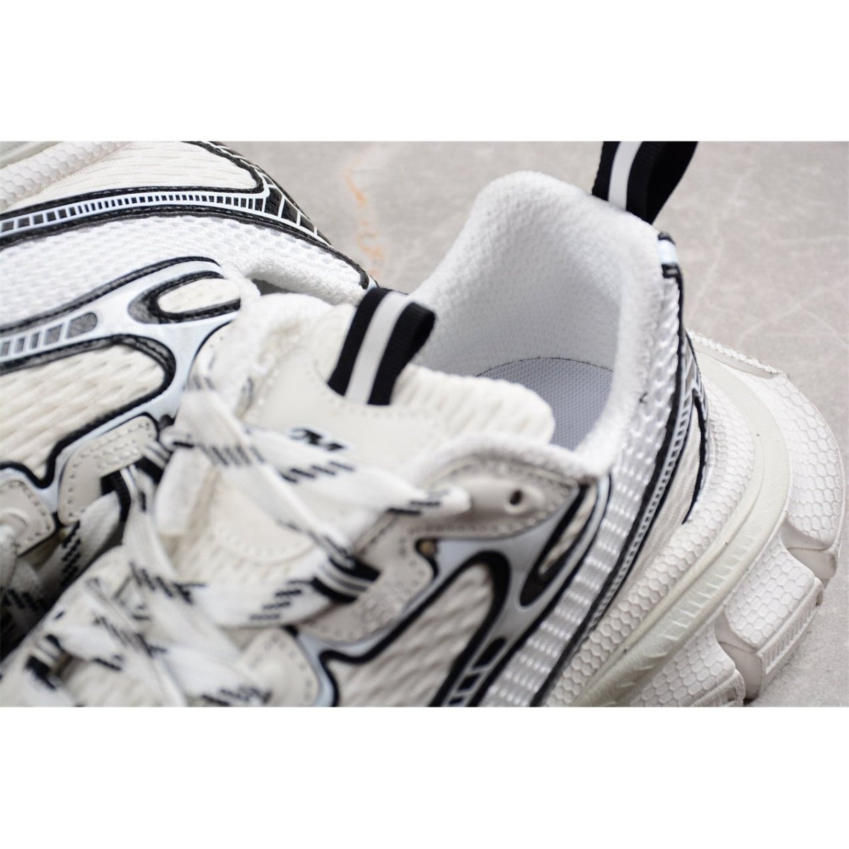 BALENCIAGA 3 - L - White Sneakers - Black Unisex Streetwear Limited Edition - The Balenciaga 3XL x White Black sneakers offer a classic colorway with a contemporary twist.