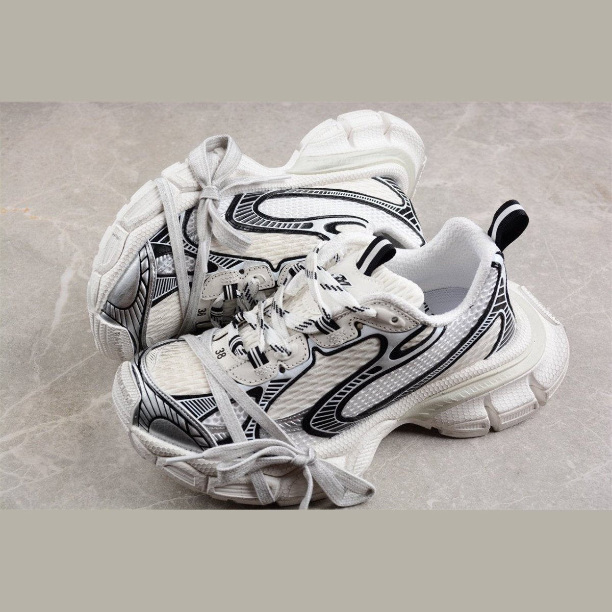BALENCIAGA 3 - L - White Sneakers - Black Unisex Streetwear Limited Edition - The Balenciaga 3XL x White Black sneakers offer a classic colorway with a contemporary twist.