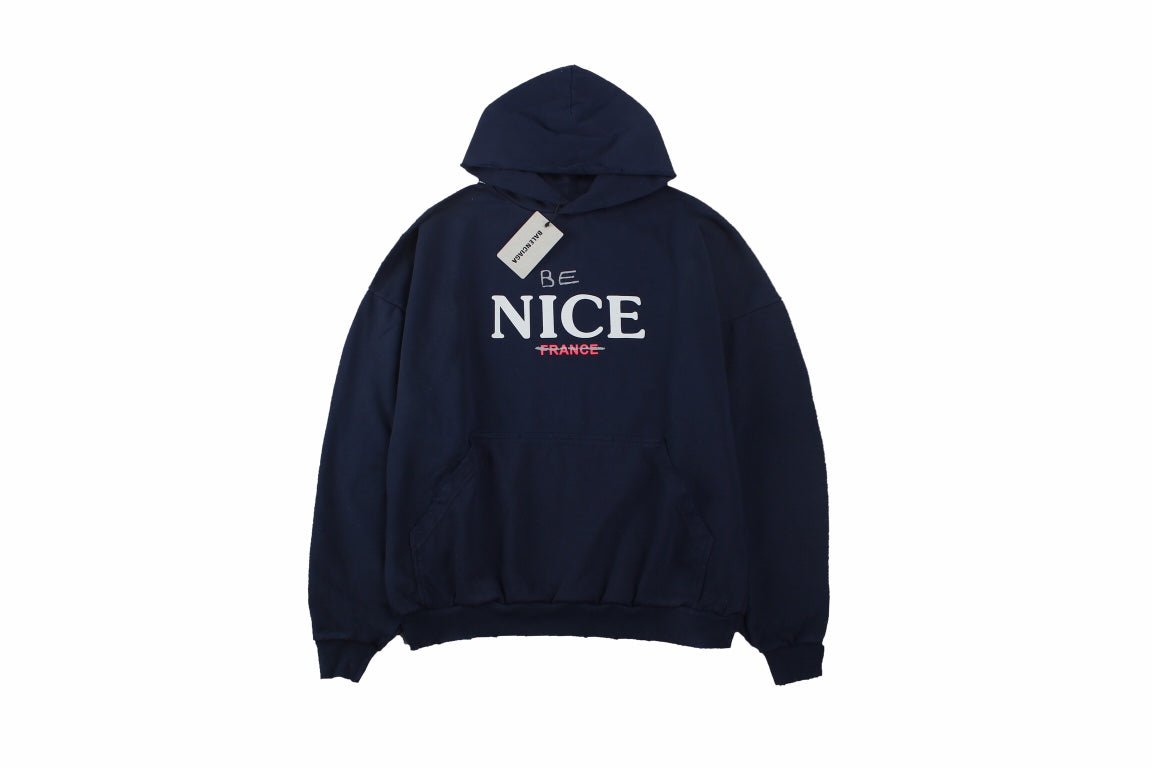 Balenciaga 'be Nice' Hoodie - Blue Unisex Streetwear Limited Edition - This Balenciaga hoodie features a playful 'Be Nice' slogan with 'France' crossed out beneath it.