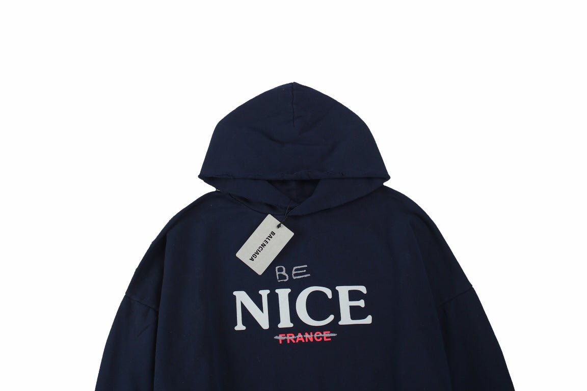 Balenciaga 'be Nice' Hoodie - Blue Unisex Streetwear Limited Edition - This Balenciaga hoodie features a playful 'Be Nice' slogan with 'France' crossed out beneath it.