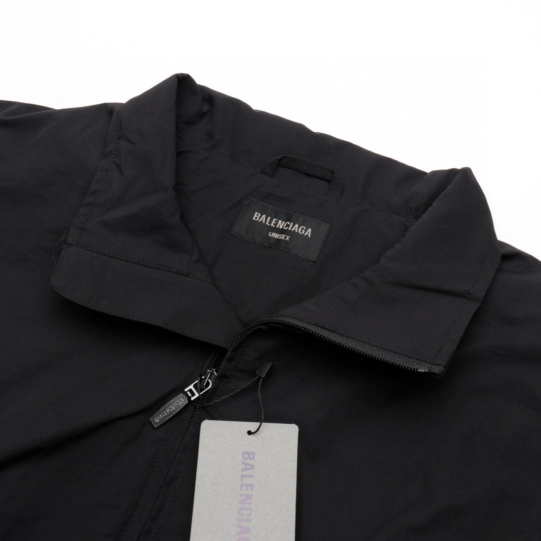 Balenciaga Lightweight Jacket - - Black Unisex Streetwear Limited Edition - This Balenciaga jacket features a minimalist design in a sleek black color. It has a