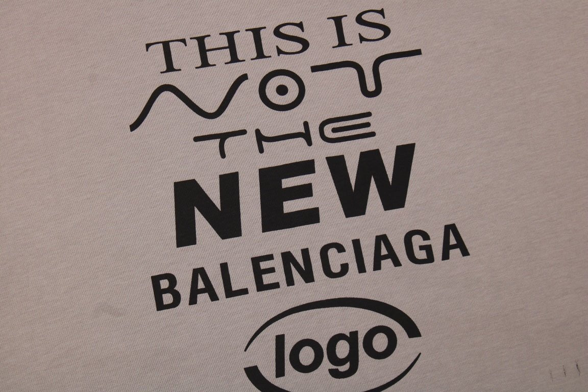 Balenciaga 'this Is Not The New Logo' T-shirt - Red Unisex Streetwear Limited Edition - This unique taupe-colored Balenciaga t-shirt carries a self-aware message, 'This is Not the New Balenciaga