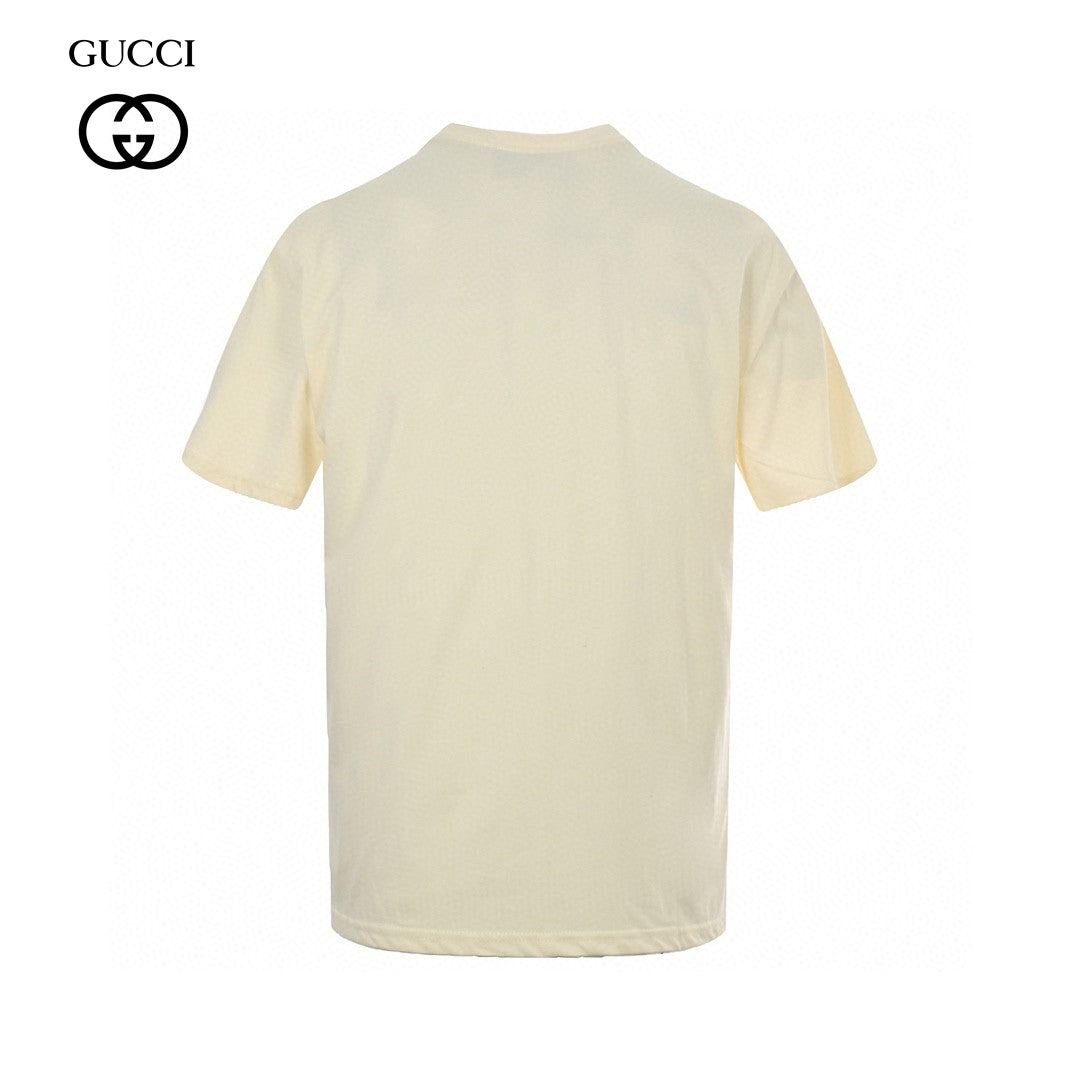 Gucci T-shirt With Dragon Cartoon - Cream Unisex Streetwear Limited Edition - <span>Playful and vibrant. Features a colorful dragon cartoon. Gucci logo on the character. Made from