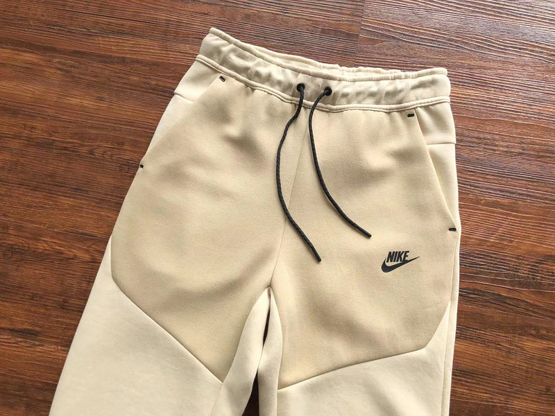 NIKE Tech Fleece Pants - Beach - Brown Unisex Streetwear Limited Edition - The NIKE TECH FLEECE PANTS BEACH BROWN - REPLICA deliver a perfect mix of modern