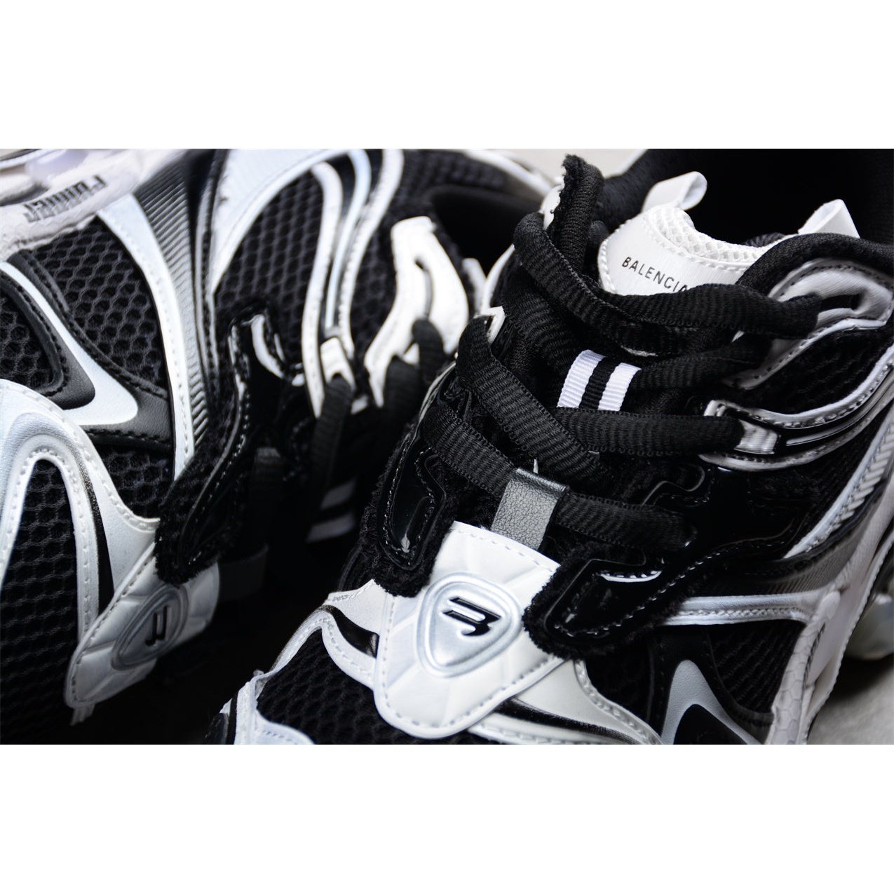BALENCIAGA Runner - White Sneakers - Black Unisex Streetwear Limited Edition - The BALENCIAGA Runner x Black White sneakers exude a sleek and timeless elegance, perfect for