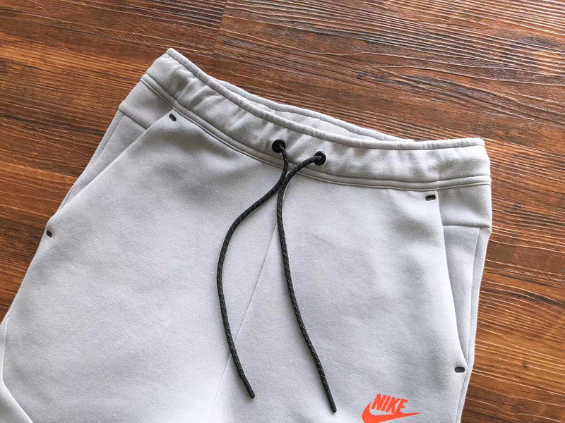 NIKE Tech Fleece Pants - Wolf Grey - Aquamarine - - Orange Unisex Streetwear Limited Edition - The NIKE TECH FLEECE PANTS WOLF GREY/AQUAMARINE/ORANGE - REPLICA offer a modern fusion of performance,