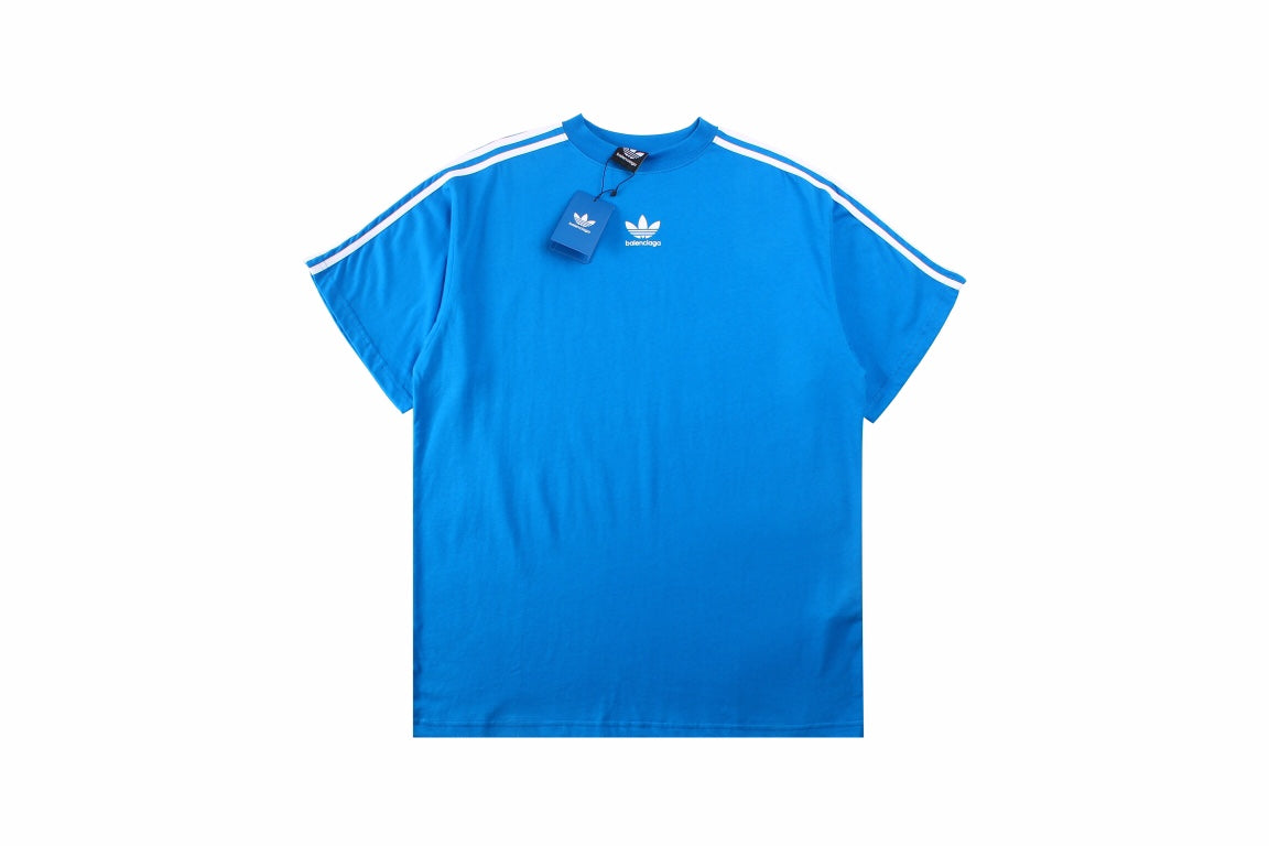 Balenciaga T-shirt With Adidas Collaboration - Blue Unisex Streetwear Limited Edition - <p dir='ltr'><span>Blue t-shirt featuring the iconic Adidas three stripes on the shoulders and a