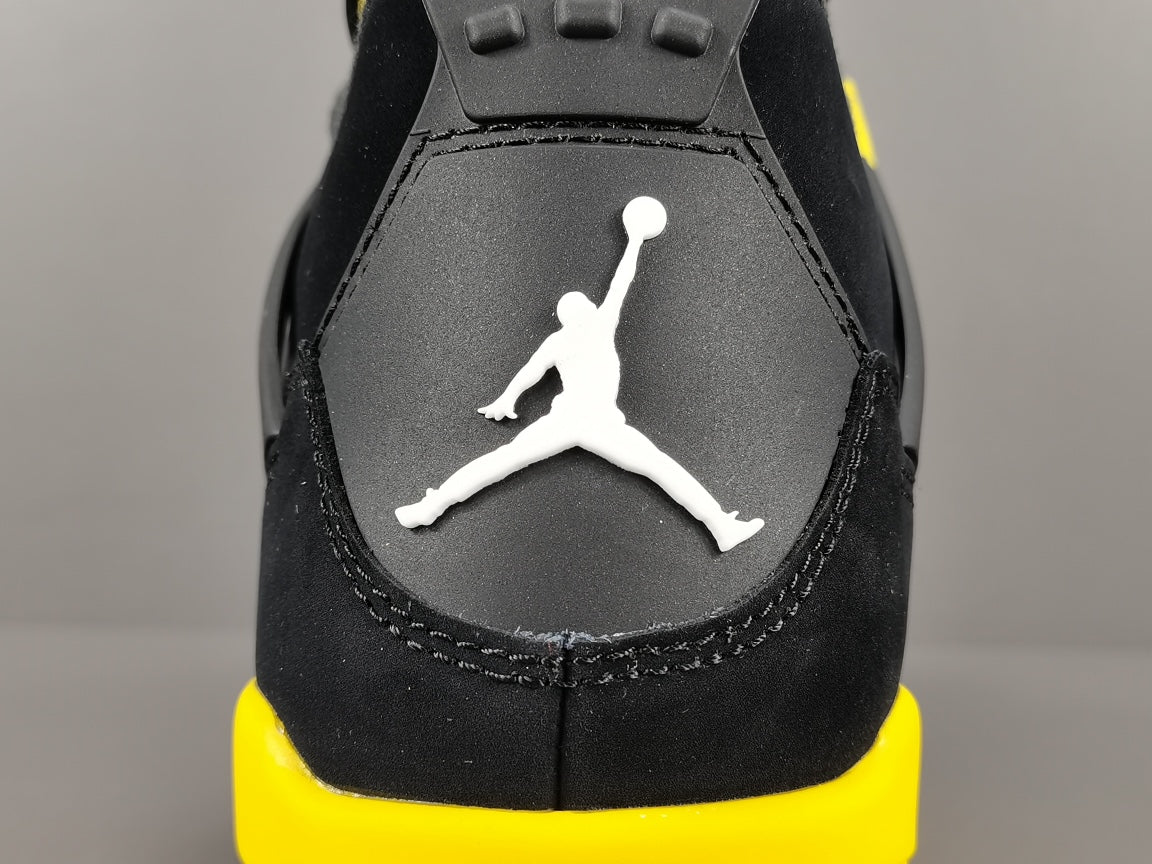 JORDAN 4 - Thunder Sneakers - Black Unisex Streetwear Limited Edition - Introducing the iconic Jordan 4 Thunder, a legendary sneaker that embodies the spirit of greatness