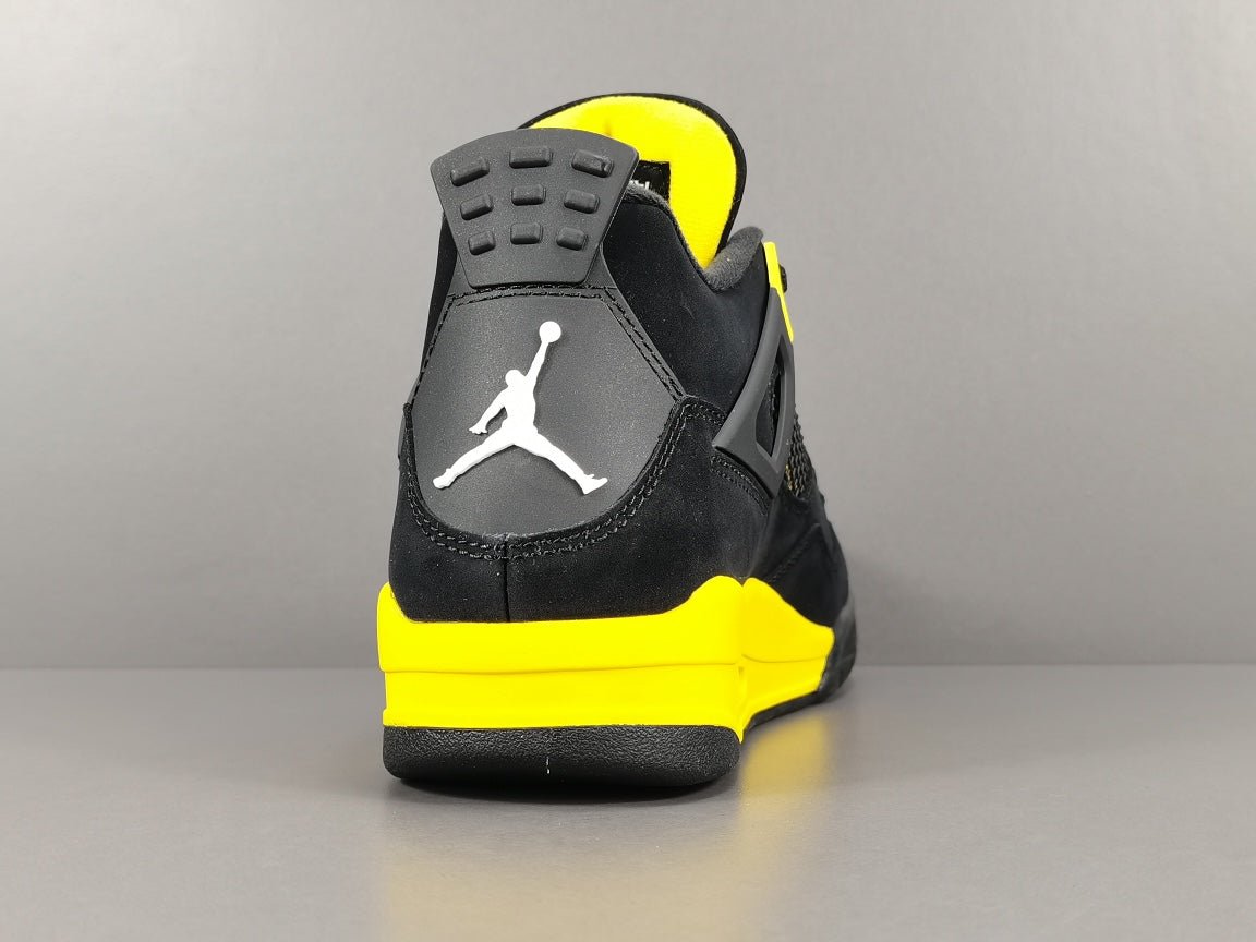 JORDAN 4 - Thunder Sneakers - Black Unisex Streetwear Limited Edition - Introducing the iconic Jordan 4 Thunder, a legendary sneaker that embodies the spirit of greatness
