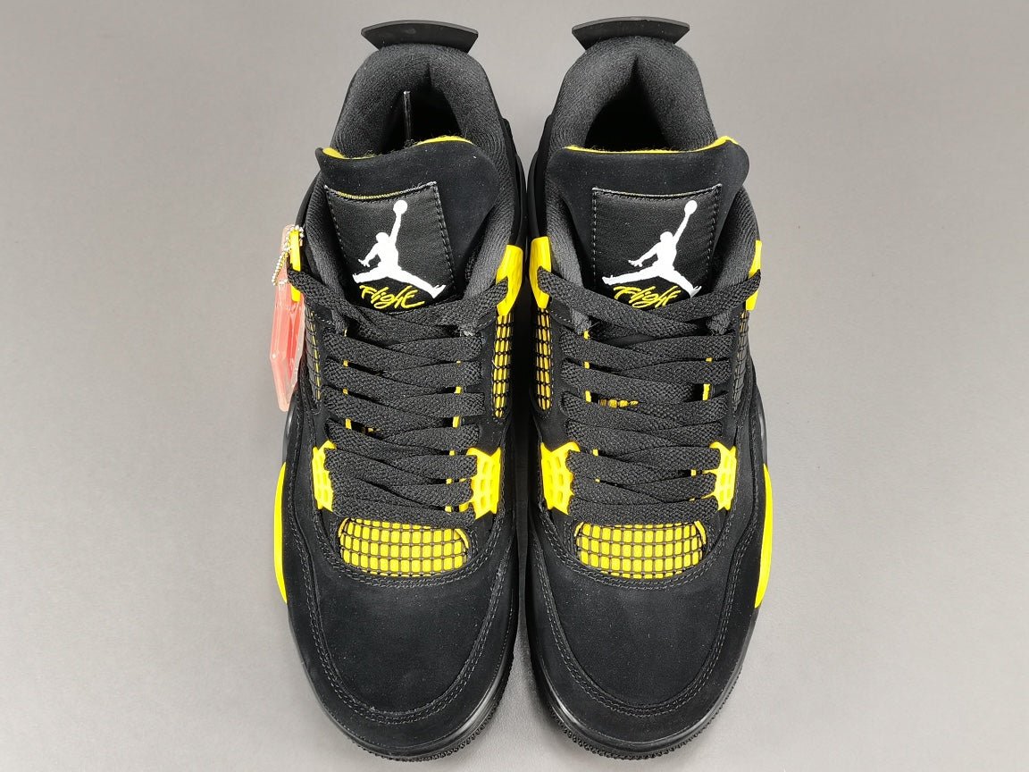 JORDAN 4 - Thunder Sneakers - Black Unisex Streetwear Limited Edition - Introducing the iconic Jordan 4 Thunder, a legendary sneaker that embodies the spirit of greatness
