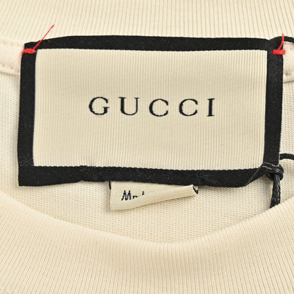 Camiseta con gráfico de snowboarder de Gucci