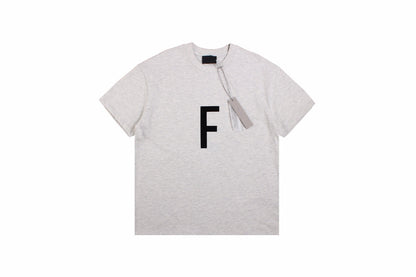 Fear Of God Letter F T-shirt (light Grey) Unisex Streetwear Limited Edition - <p dir='ltr'><span>This Fear of God t-shirt features a bold letter 'F' graphic on the