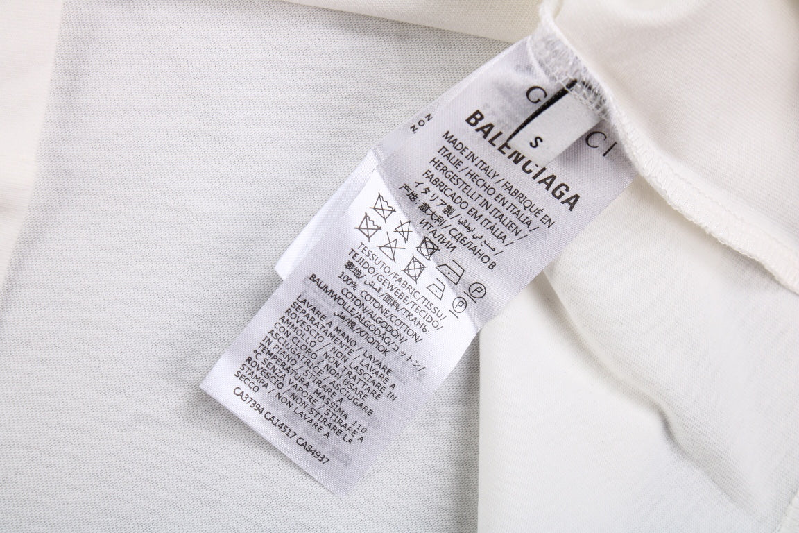 Camiseta blanca GUCCI x BALENCIAGA con logo de flor