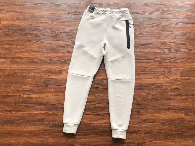 NIKE Tech Fleece Pants - Creamy - White Unisex Streetwear Limited Edition - The NIKE TECH FLEECE PANTS CREAMY WHITE - REPLICA offer the perfect combination of modern